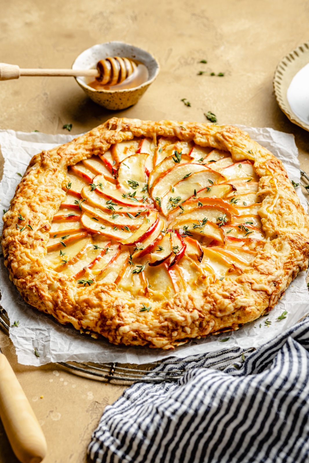 apple cheddar galette on parchment paper