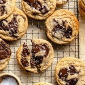 brown butter banana chocolate chunk cookies on a wire rack