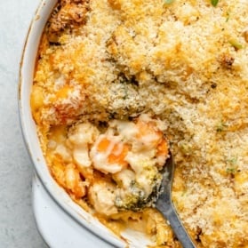 cheddar cauliflower broccoli gratin in a baking pan