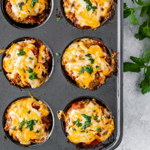 chicken quinoa enchilada meatloaf muffins in a muffin tin