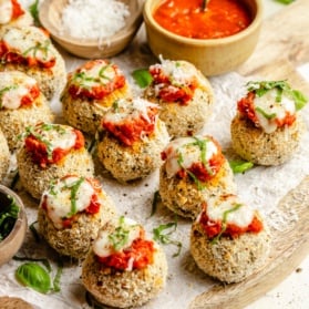 chicken parmesan meatballs on parchment paper