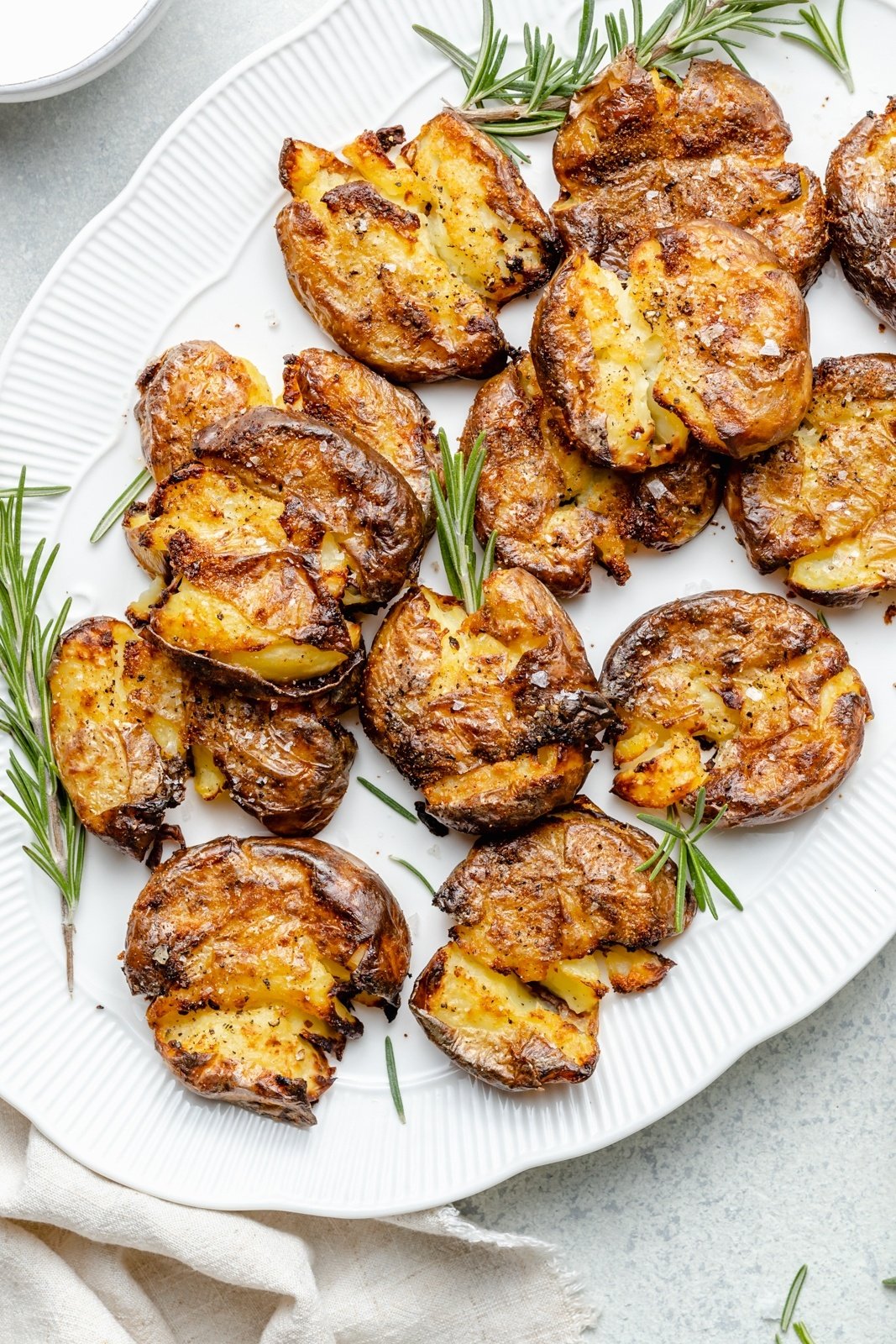 the best crispy smashed potatoes on a platter