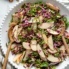 kale apple salad in a serving bowl