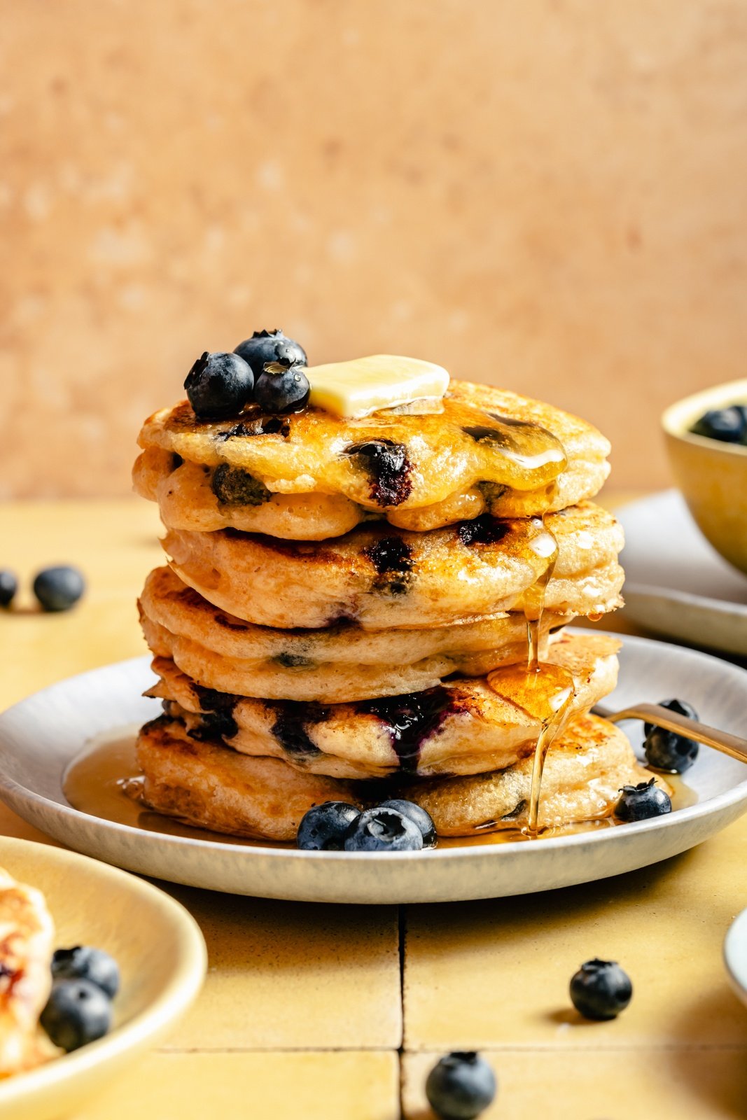 stack of buttermilk blueberry pancakes on a plate