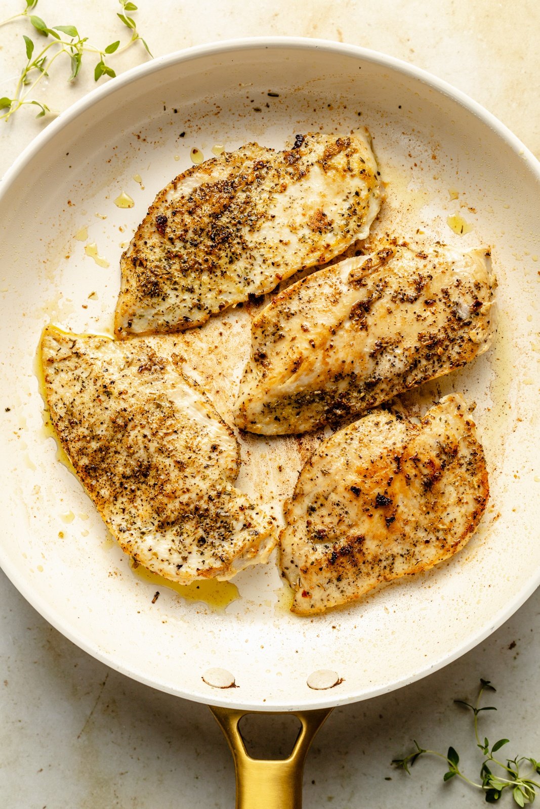 cooking chicken in a skillet