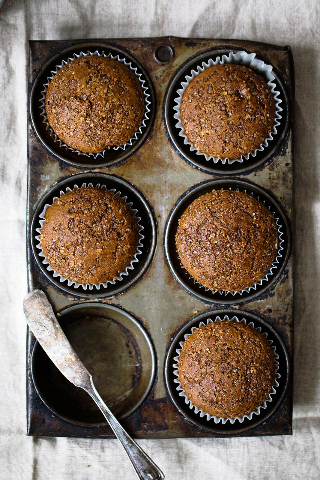 Healthy gingerbread muffins in a muffin tin