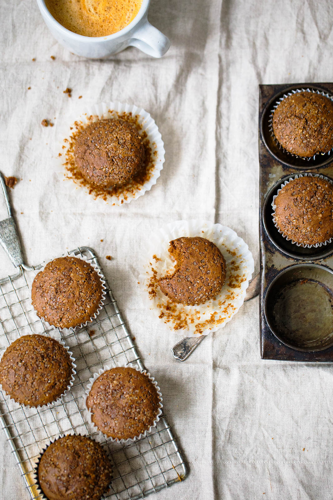 homemade healthy gingerbread muffins in a muffin tin and on a wire rack