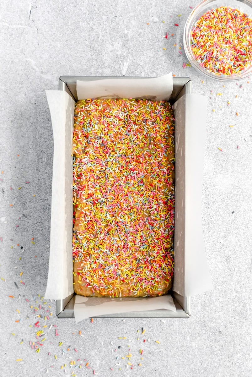 unbaked birthday cake loaf in a loaf pan