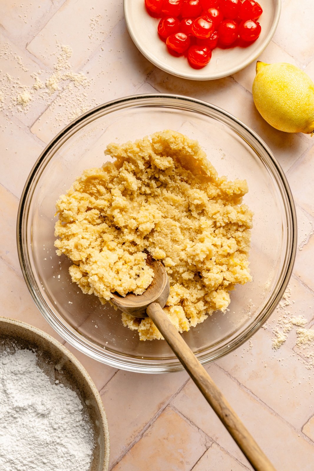 mixing dough for almond cherry cookies