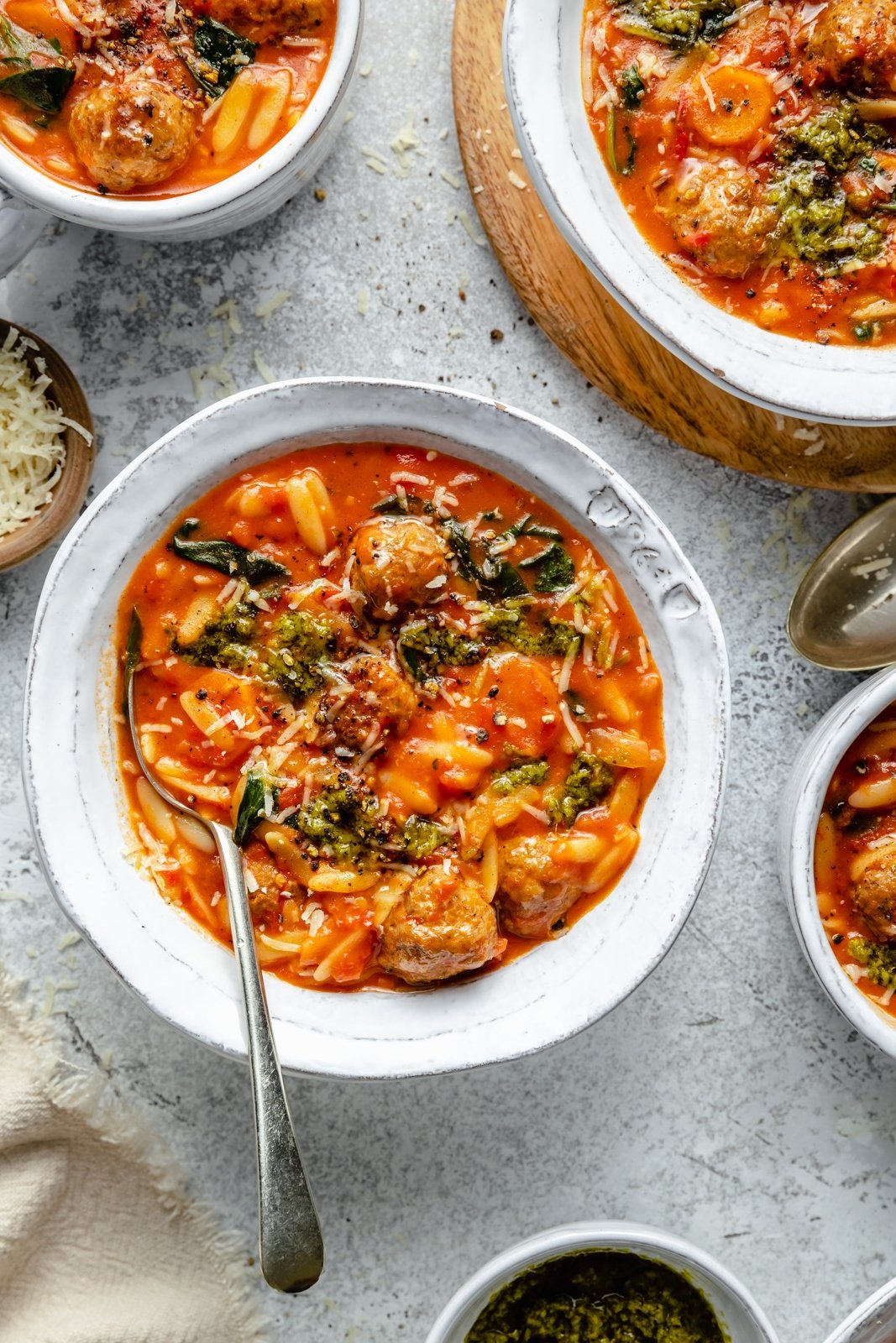 tomato orzo soup with meatballs in a bowl