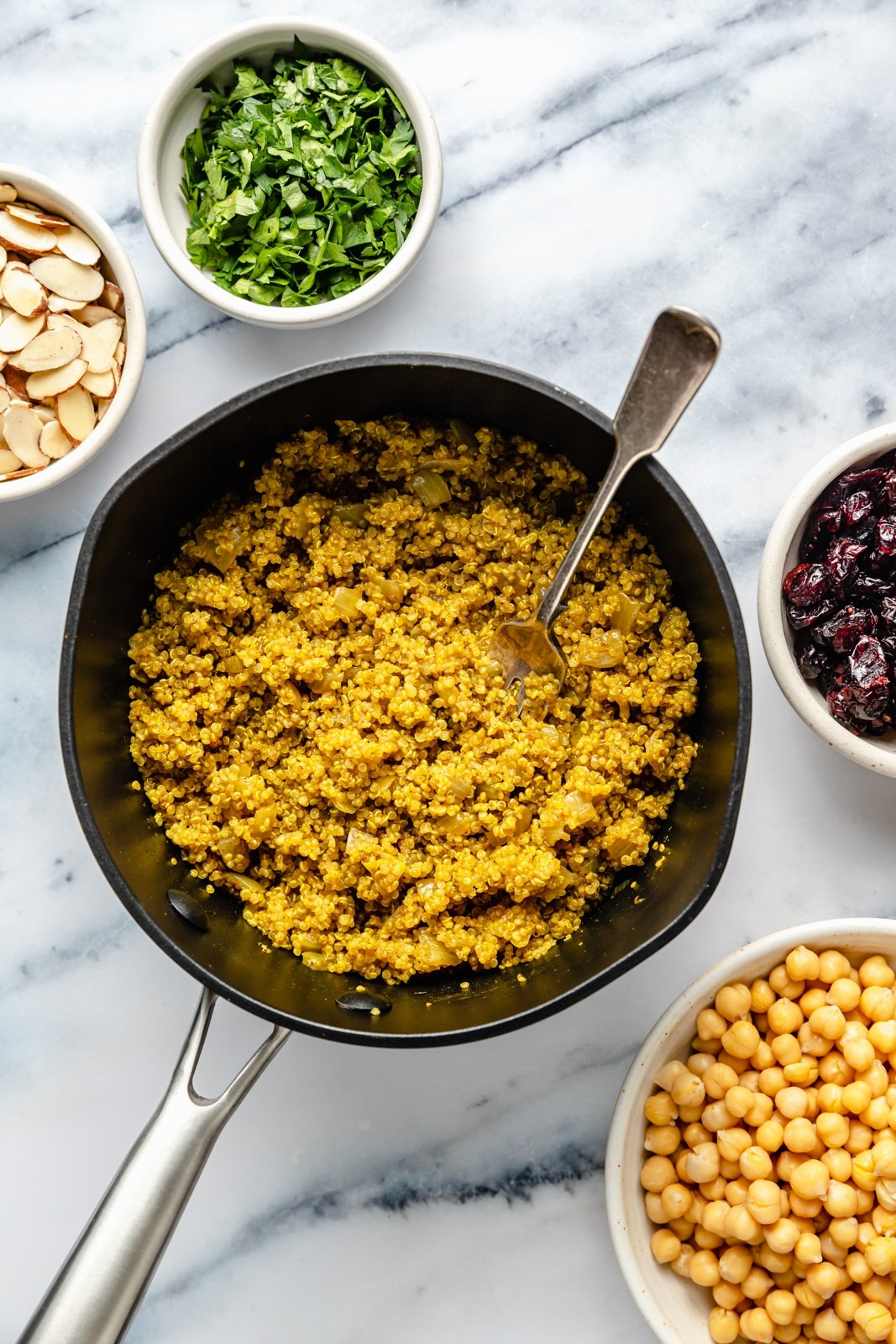 cooking quinoa in a pot for a moroccan-inspired quinoa salad