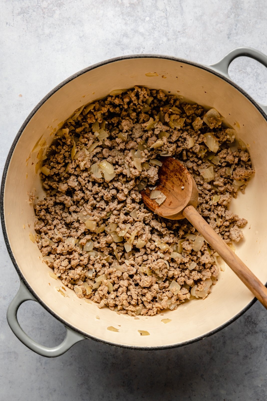 cooking ground turkey in a pot to make an easy hamburger helper recipe