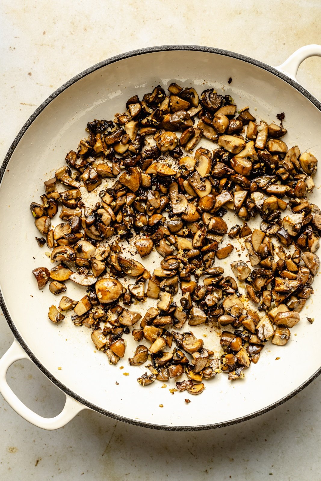 cooking mushrooms in a skillet