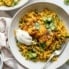 tandoori chicken with rice in a bowl