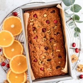 paleo cranberry orange bread on a cooling rack