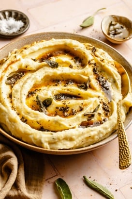 brown butter mashed potatoes in a serving bowl