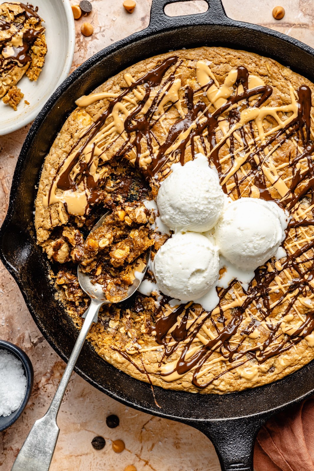 tahini butterscotch cookie skillet topped with ice cream