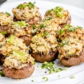 jalapeño popper stuffed mushrooms on a plate