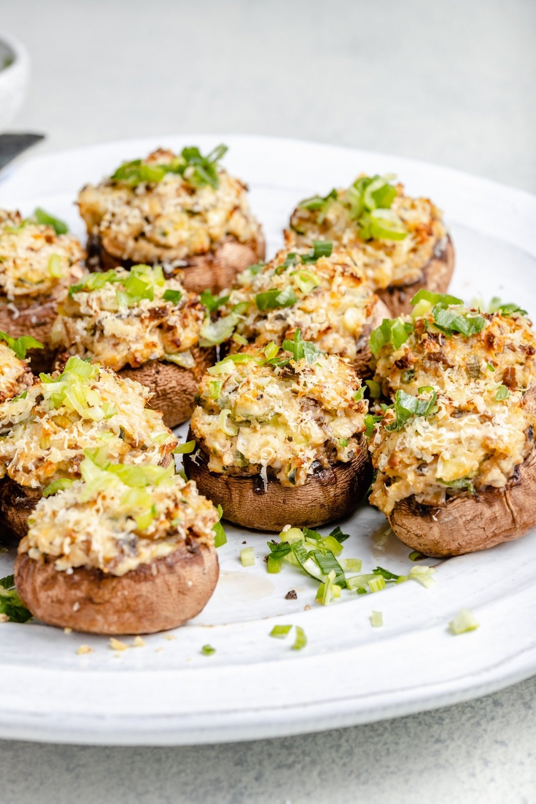 jalapeño popper stuffed mushrooms on a plate