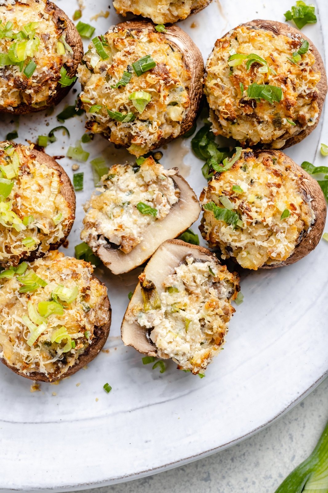 cheesy jalapeño stuffed mushrooms on a plate