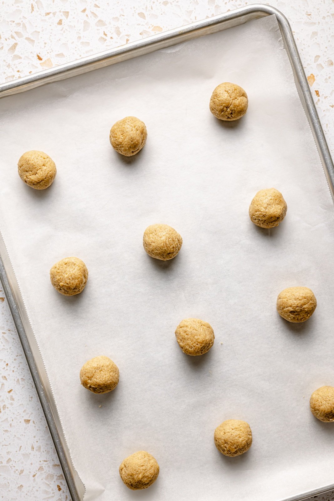 unbaked chai sugar cookies on a baking sheet