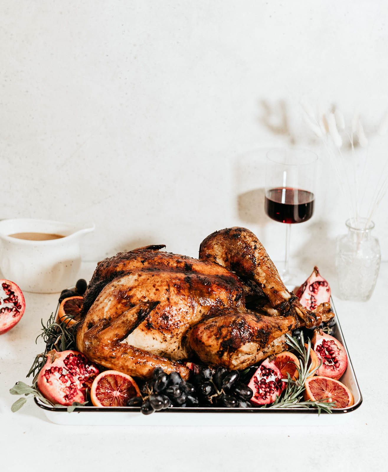 maple roasted turkey on a platter with fruit