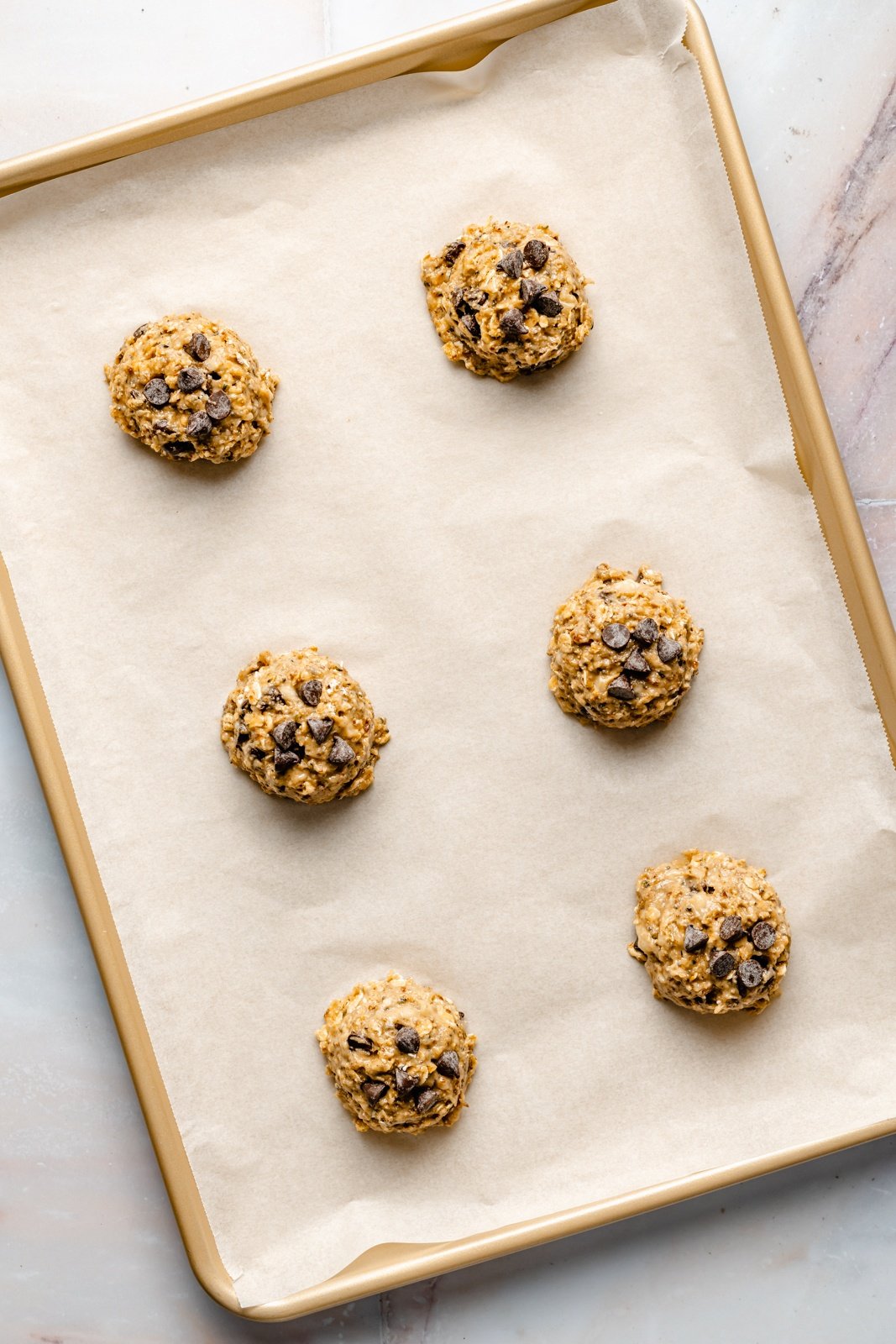 unbaked healthy breakfast cookies on a baking sheet