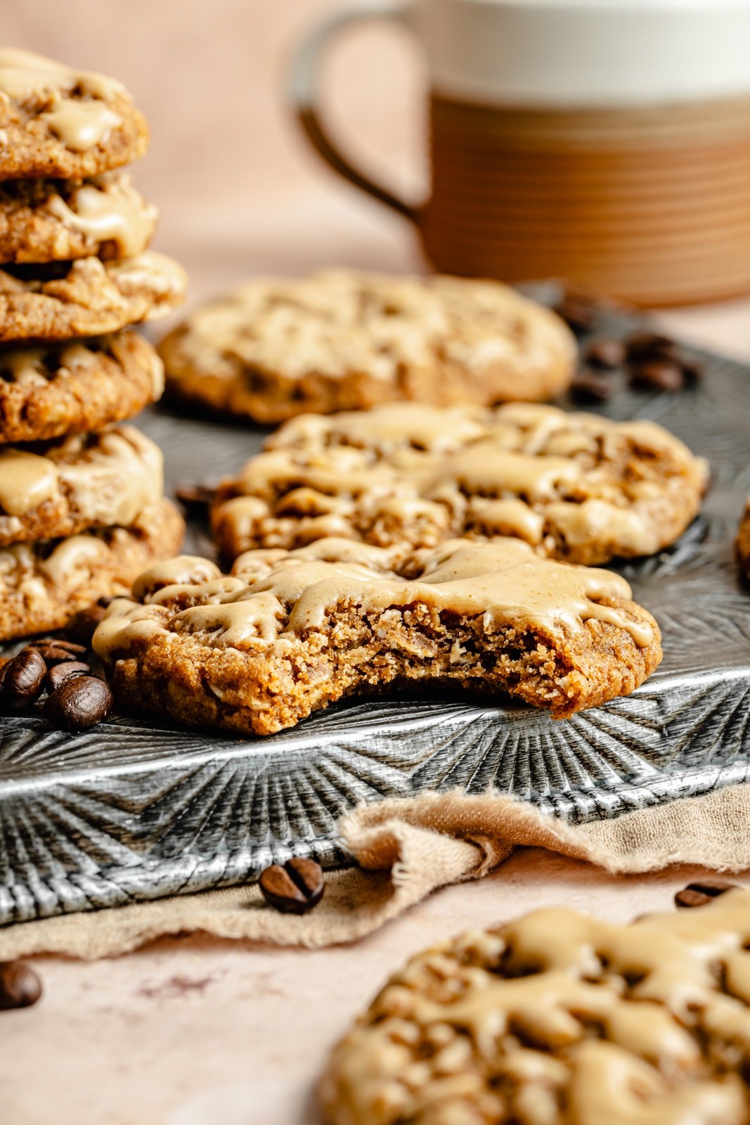 chewy oatmeal latte cookie with a bite taken out