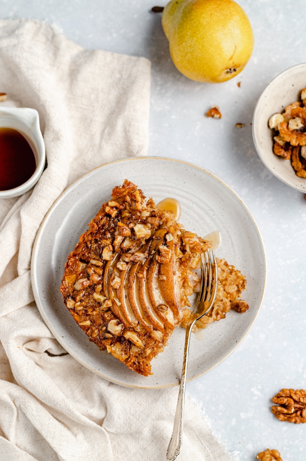 slice of pear baked oatmeal on a plate