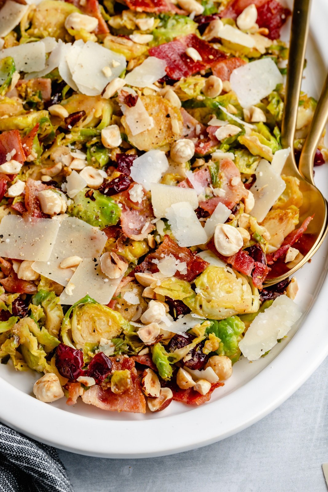 warm brussels salad with bacon on a platter