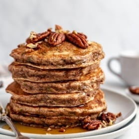 stack of healthy zucchini pancakes on a plate