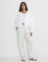 woman in a white sweatsuit