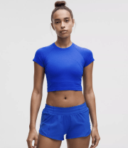 woman in a blue tshirt and blue shorts