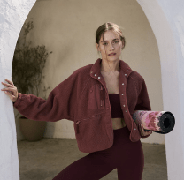 woman in a burgundy fleece jacket